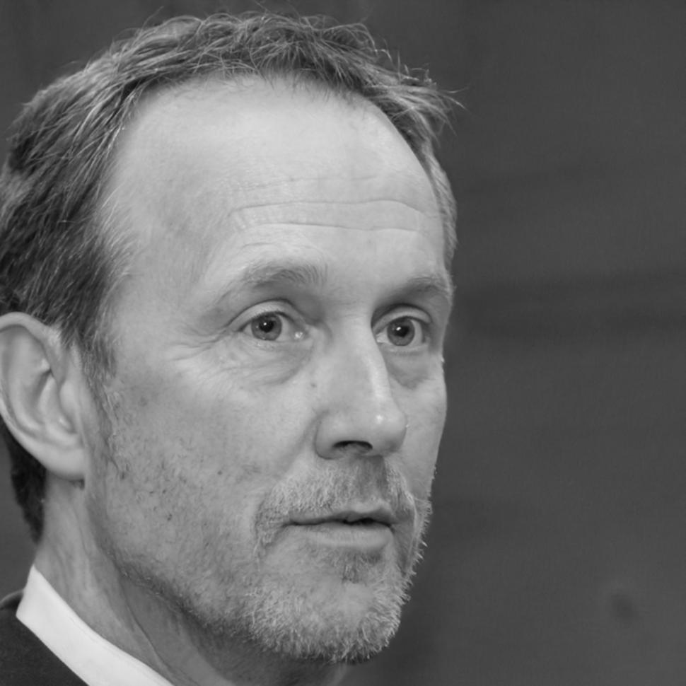 Professional headshot of Dmitri Kowalski, Blockchain Security Analyst at sparkflow-dynamic