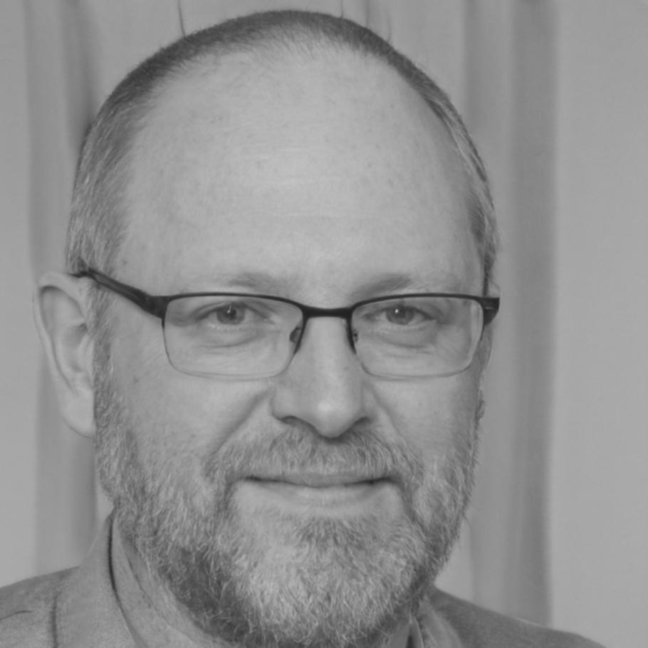 Security specialist reviewing blockchain code for vulnerabilities