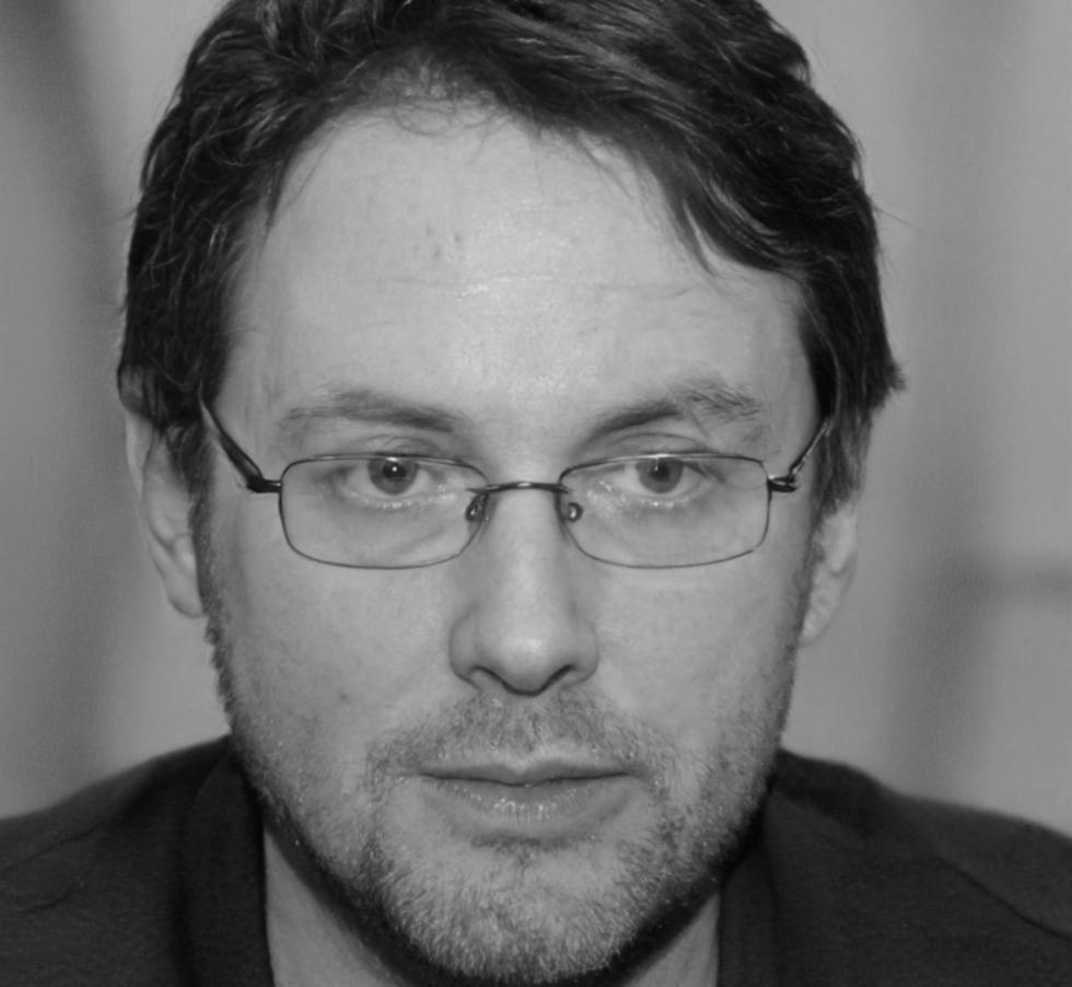 Professional headshot of Kieran Thorsson, Lead Security Architect at sparkflow-dynamic